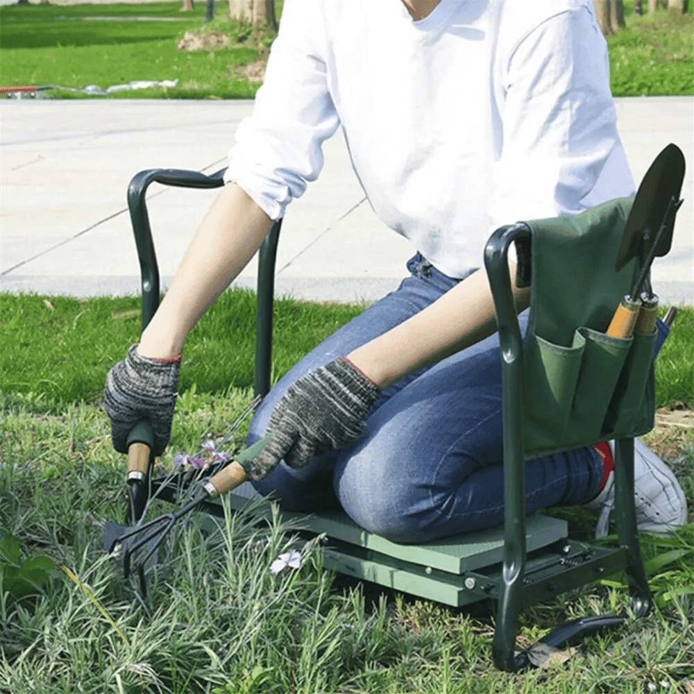 Person using the Folding Garden Kneeler Bench while planting, showing real use in backyard or garden