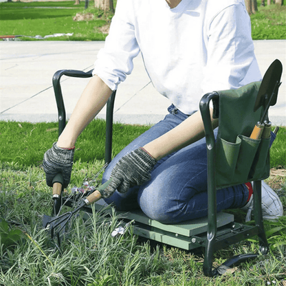 Person using the Folding Garden Kneeler Bench while planting, showing real use in backyard or garden