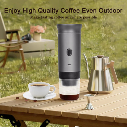 Portable espresso maker used outdoors on a wooden table with cups and coffee gear in nature