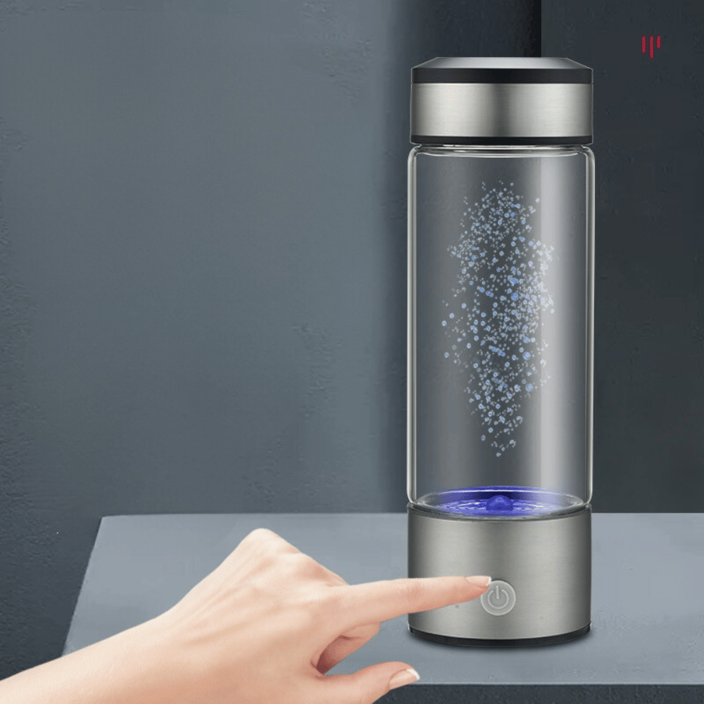Touch-activated Portable Hydrogen Water Generator emitting bubbles during hydrogenation process.